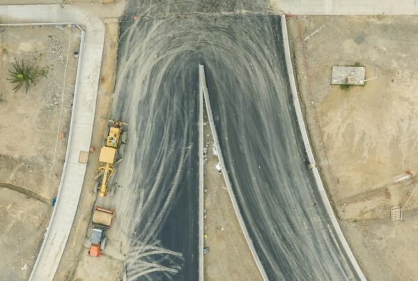 Aerial shot of road construction site in Lima, showcasing infrastructure development in Peru.
