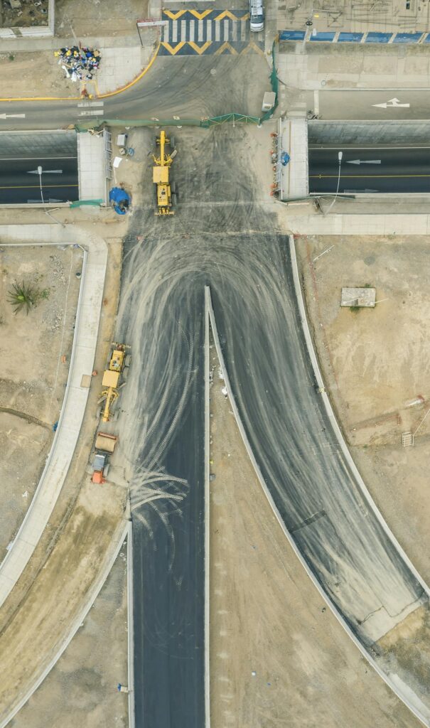 Aerial shot of road construction site in Lima, showcasing infrastructure development in Peru.